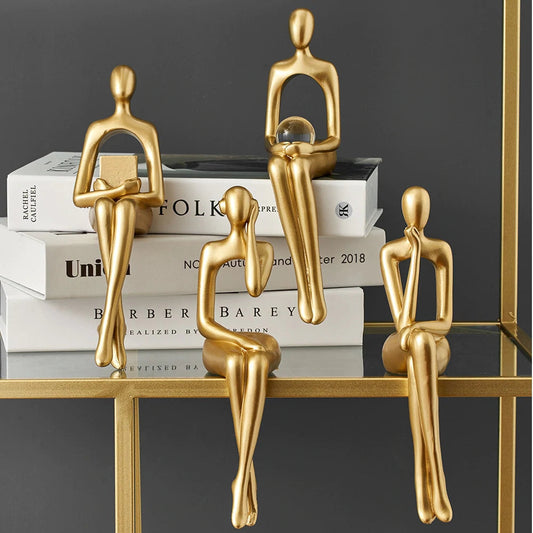 Golden Abstract Figurines